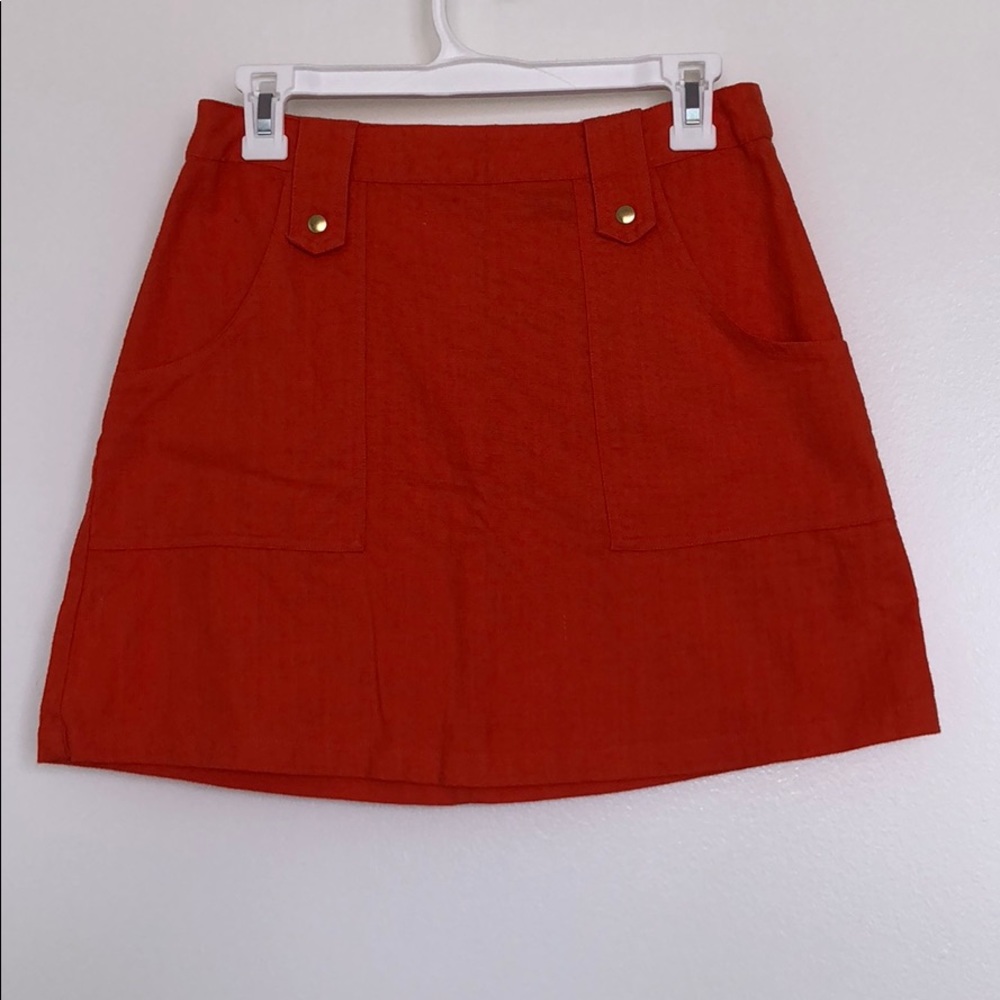 Orange mini skirt with zipper back